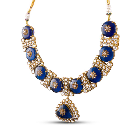 Royal blue kundan necklace set with diamond-studded floral motifs and matching earrings – handcrafted luxury jewellery by Atelier Maharanibagh.